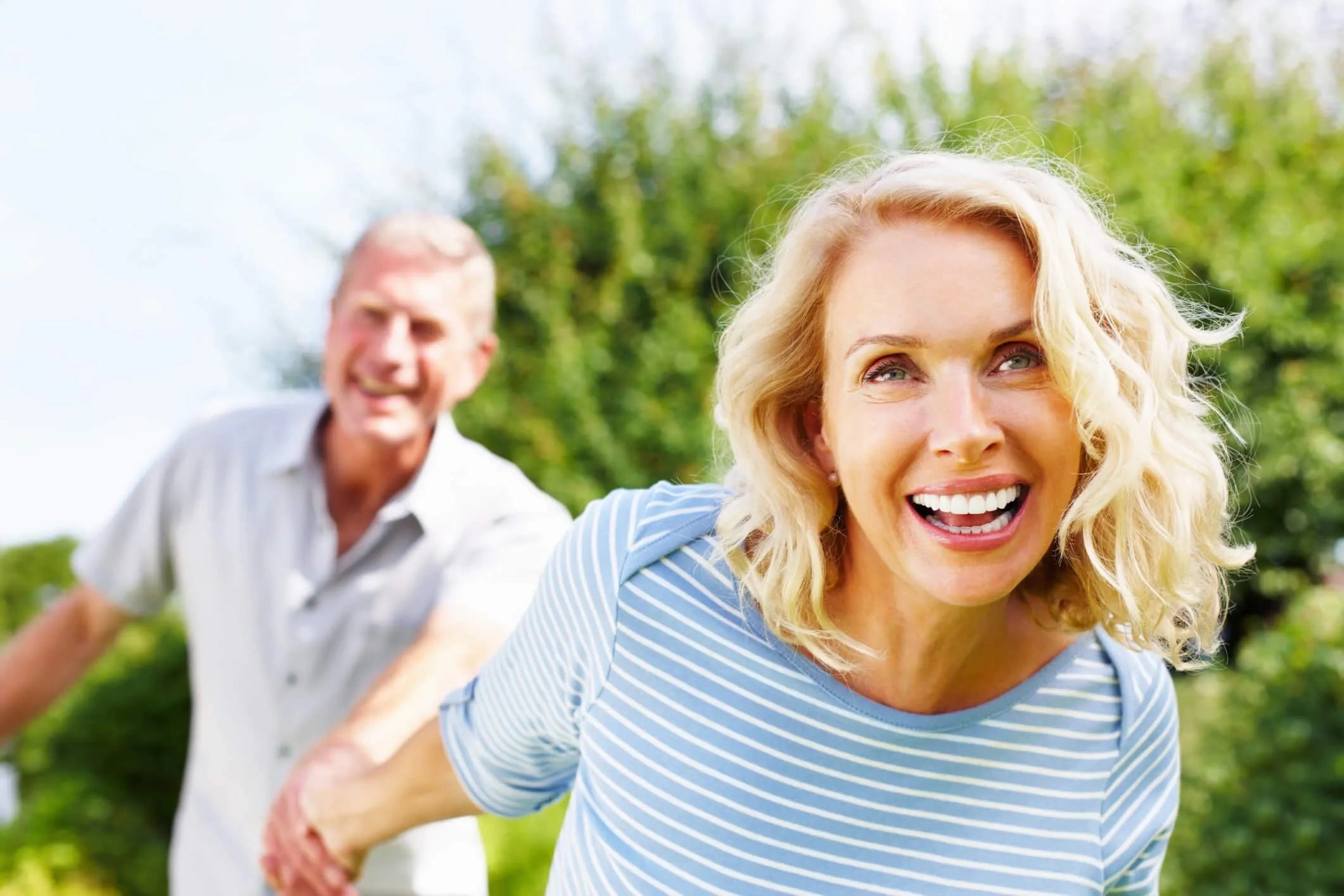 Happy couple enjoying life together outdoors